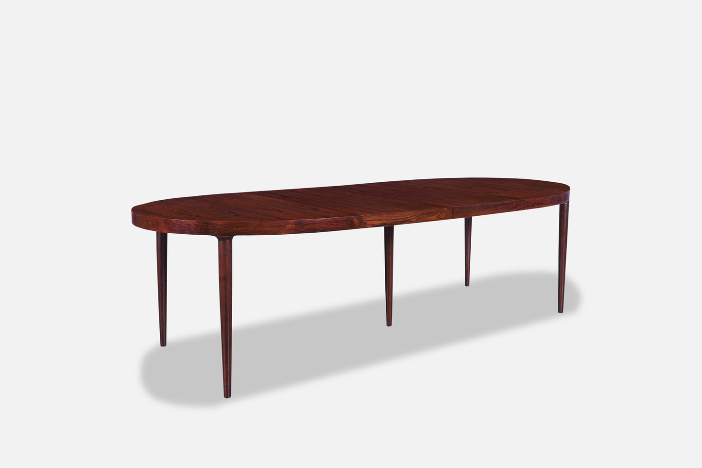 Danish Modern Expanding Rosewood Dining Table by Harry Ostergaard
