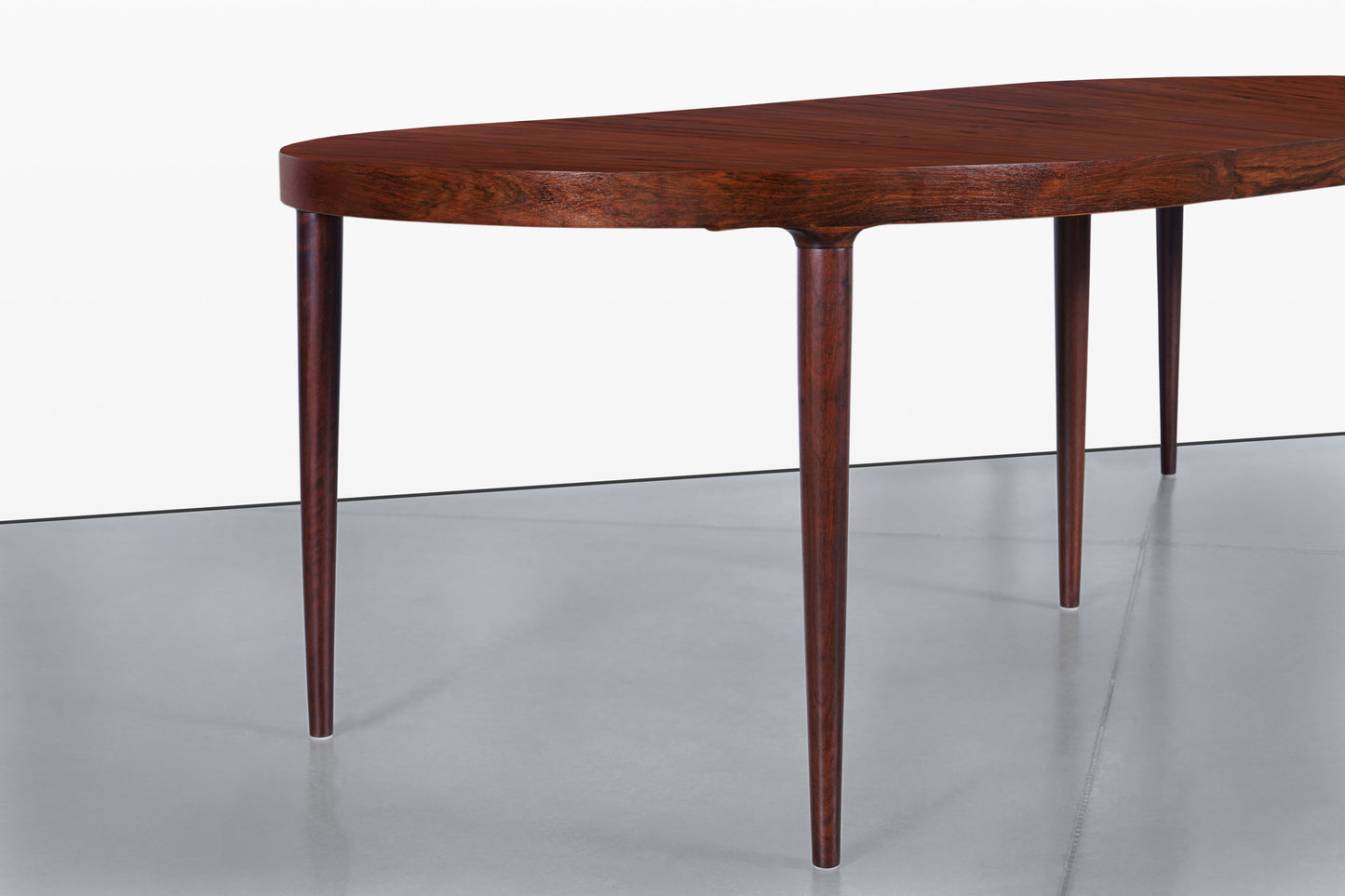 Danish Modern Expanding Rosewood Dining Table by Harry Ostergaard