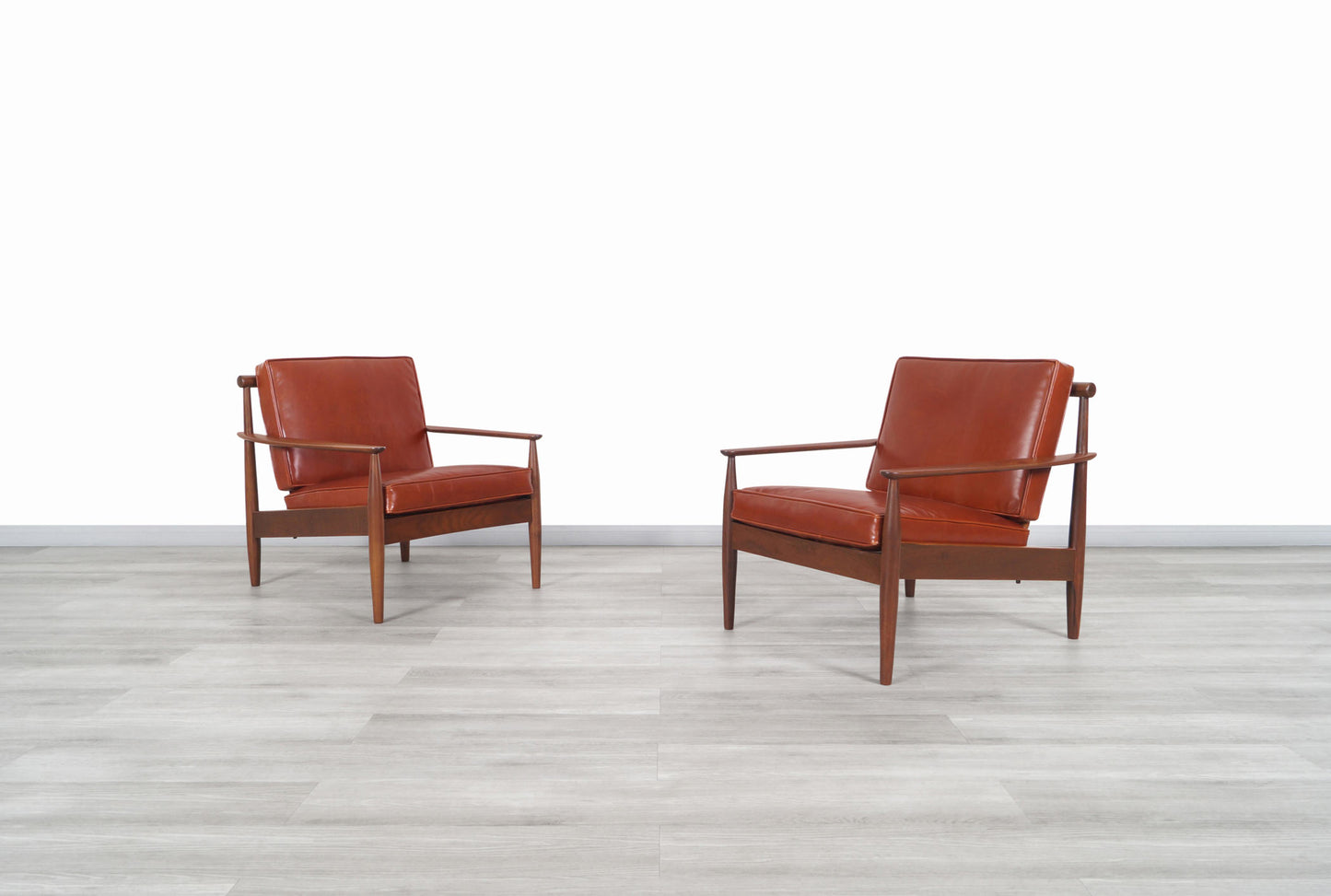Danish Modern Leather and Walnut Lounge Chairs by Hans C. Andersen