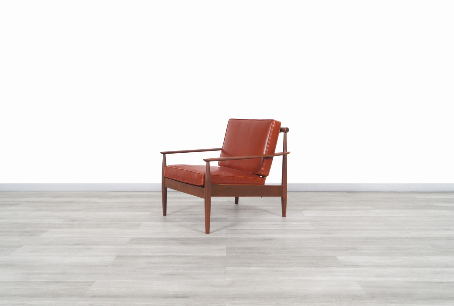 Danish Modern Leather and Walnut Lounge Chairs by Hans C. Andersen