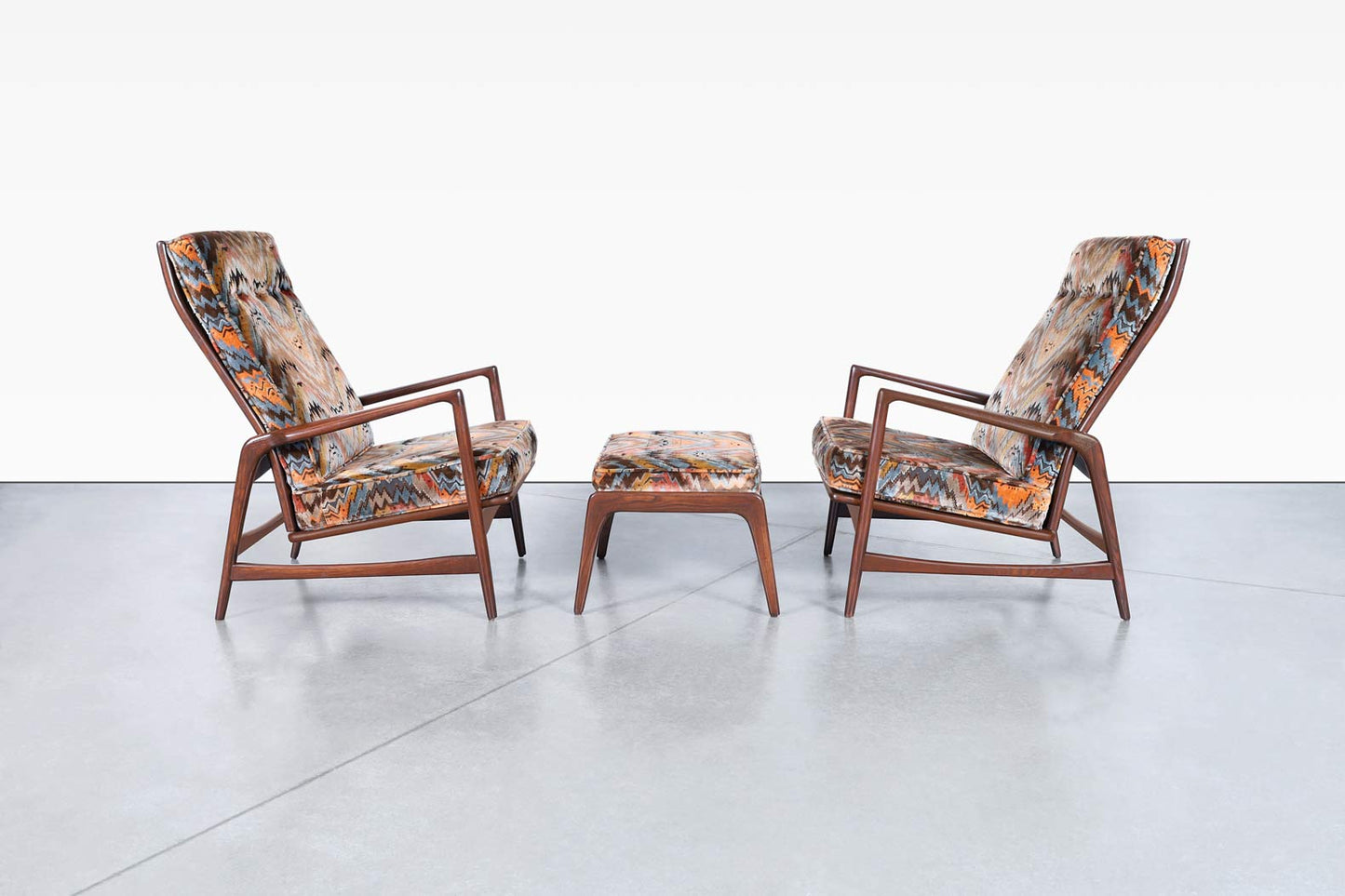 Danish Walnut Reclining Lounge Chairs and Ottoman by Ib Kofod Larsen
