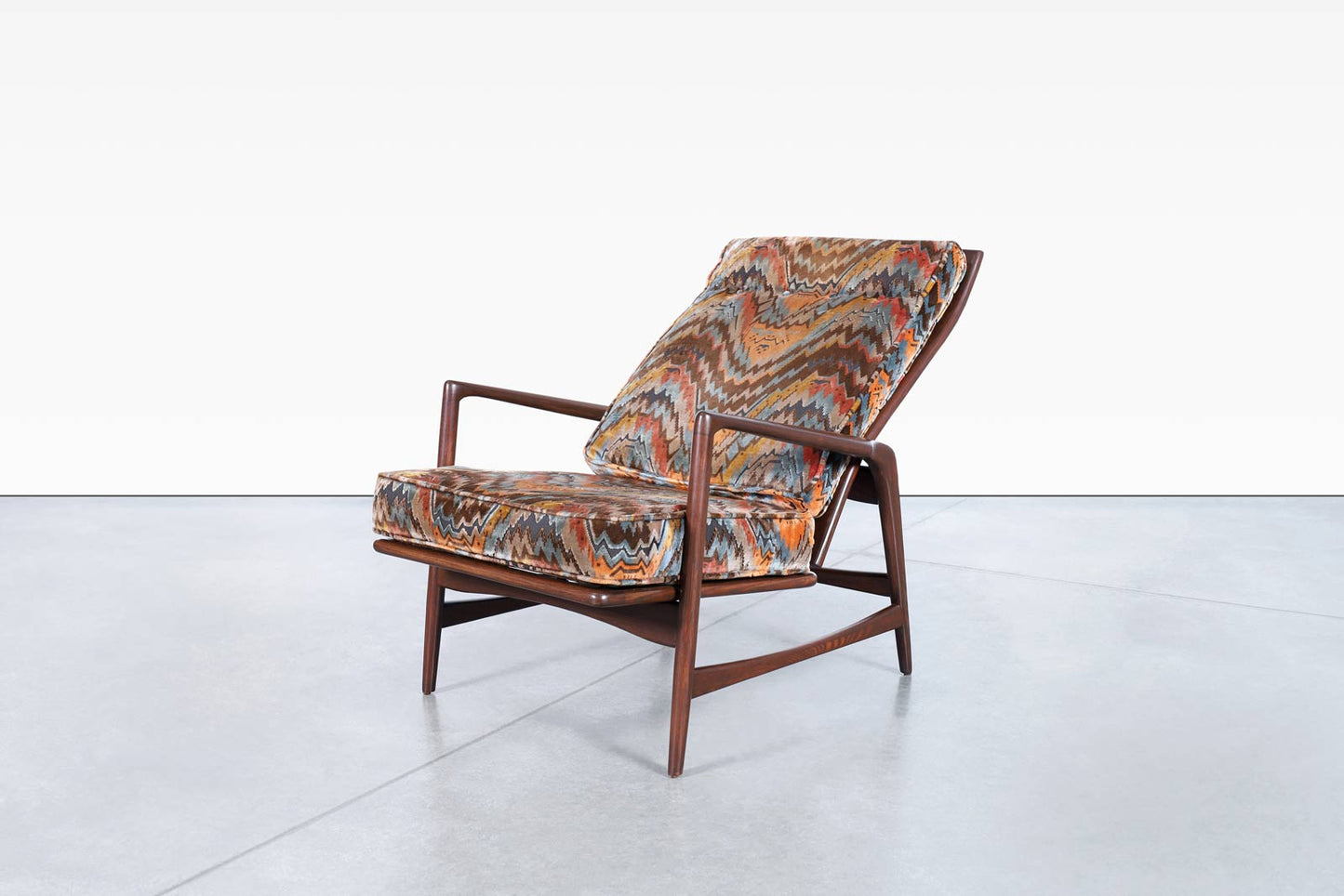 Danish Walnut Reclining Lounge Chairs and Ottoman by Ib Kofod Larsen