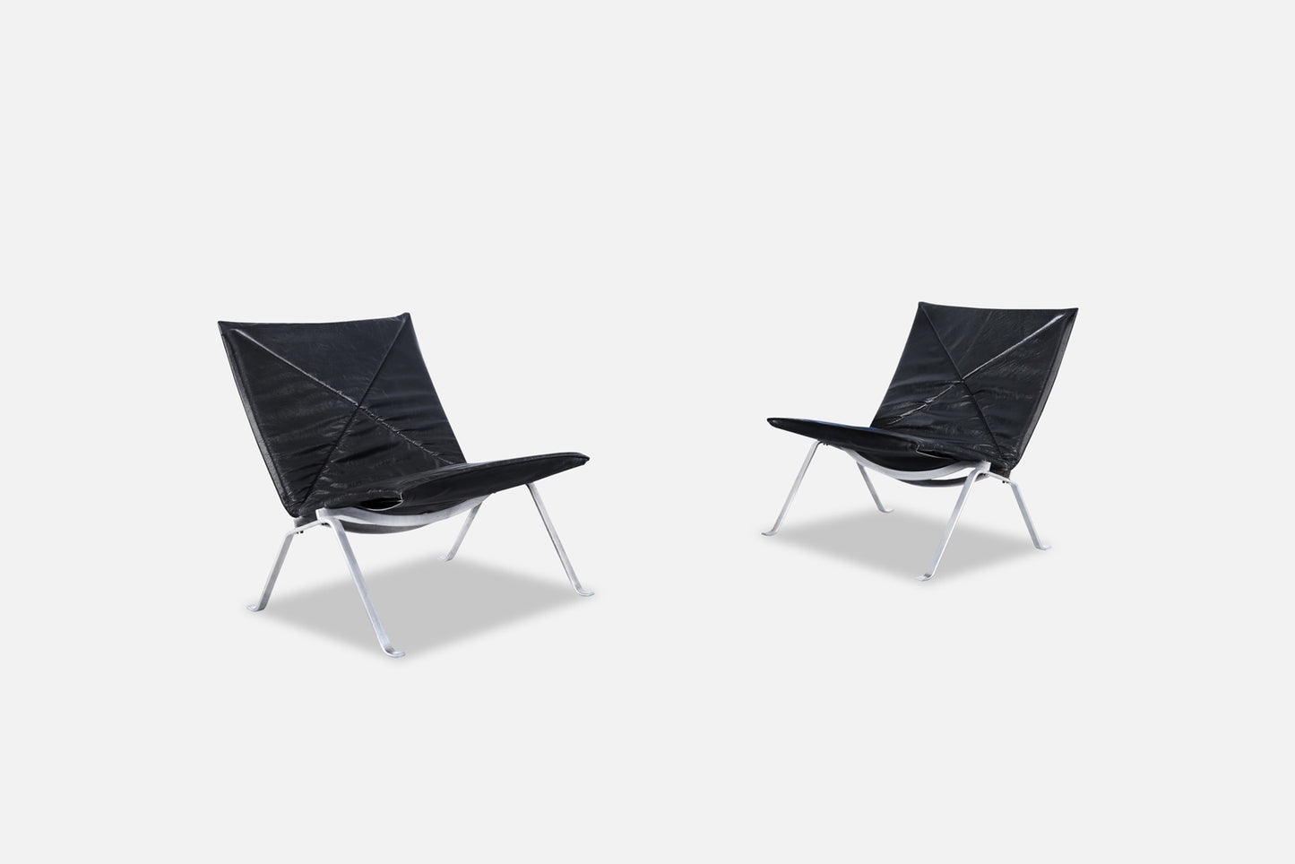 Early Leather PK22 Lounge Chairs by Poul Kjearholm for E. Kold Christensen