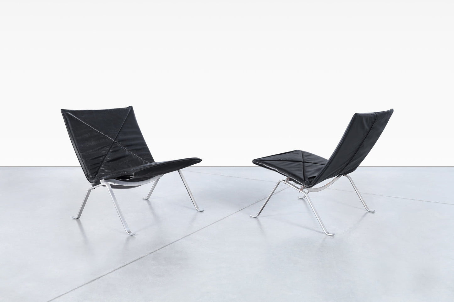 Early Leather PK22 Lounge Chairs by Poul Kjearholm for E. Kold Christensen