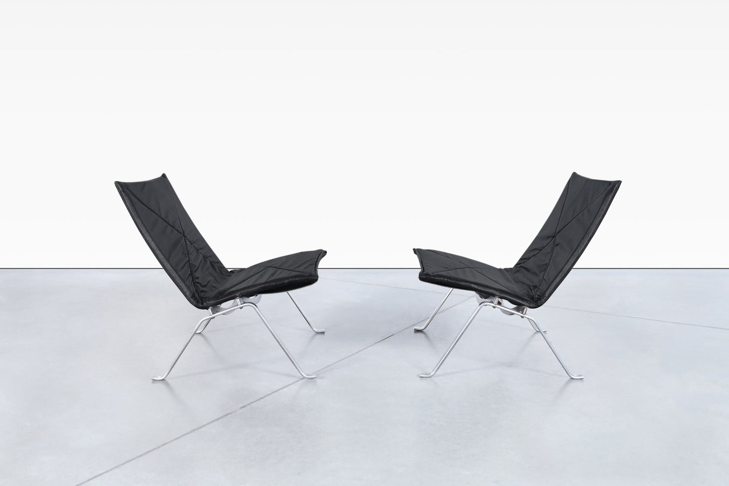 Early Leather PK22 Lounge Chairs by Poul Kjearholm for E. Kold Christensen