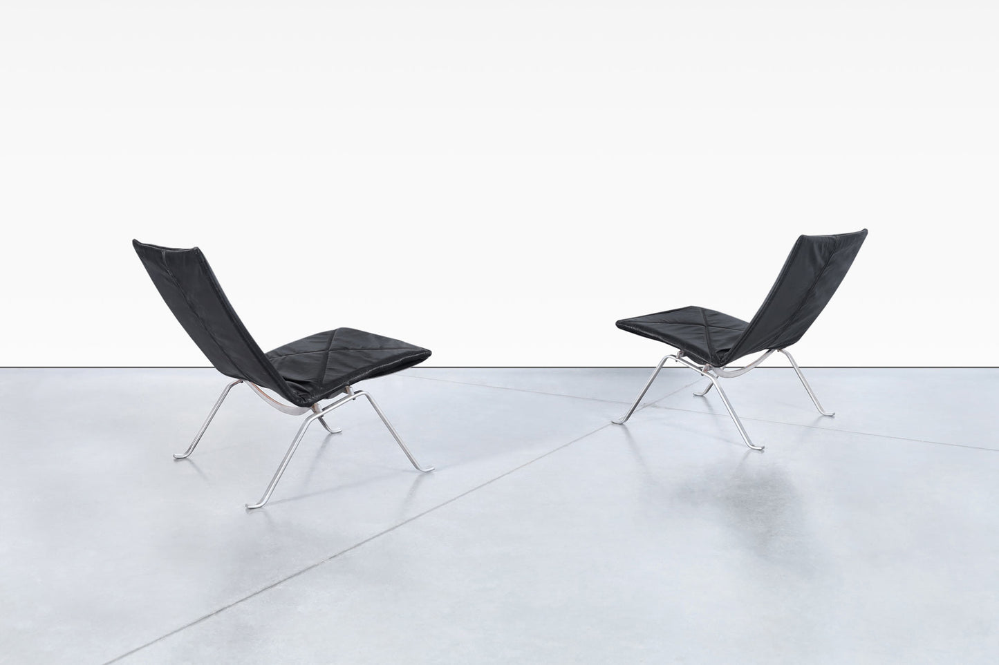 Early Leather PK22 Lounge Chairs by Poul Kjearholm for E. Kold Christensen