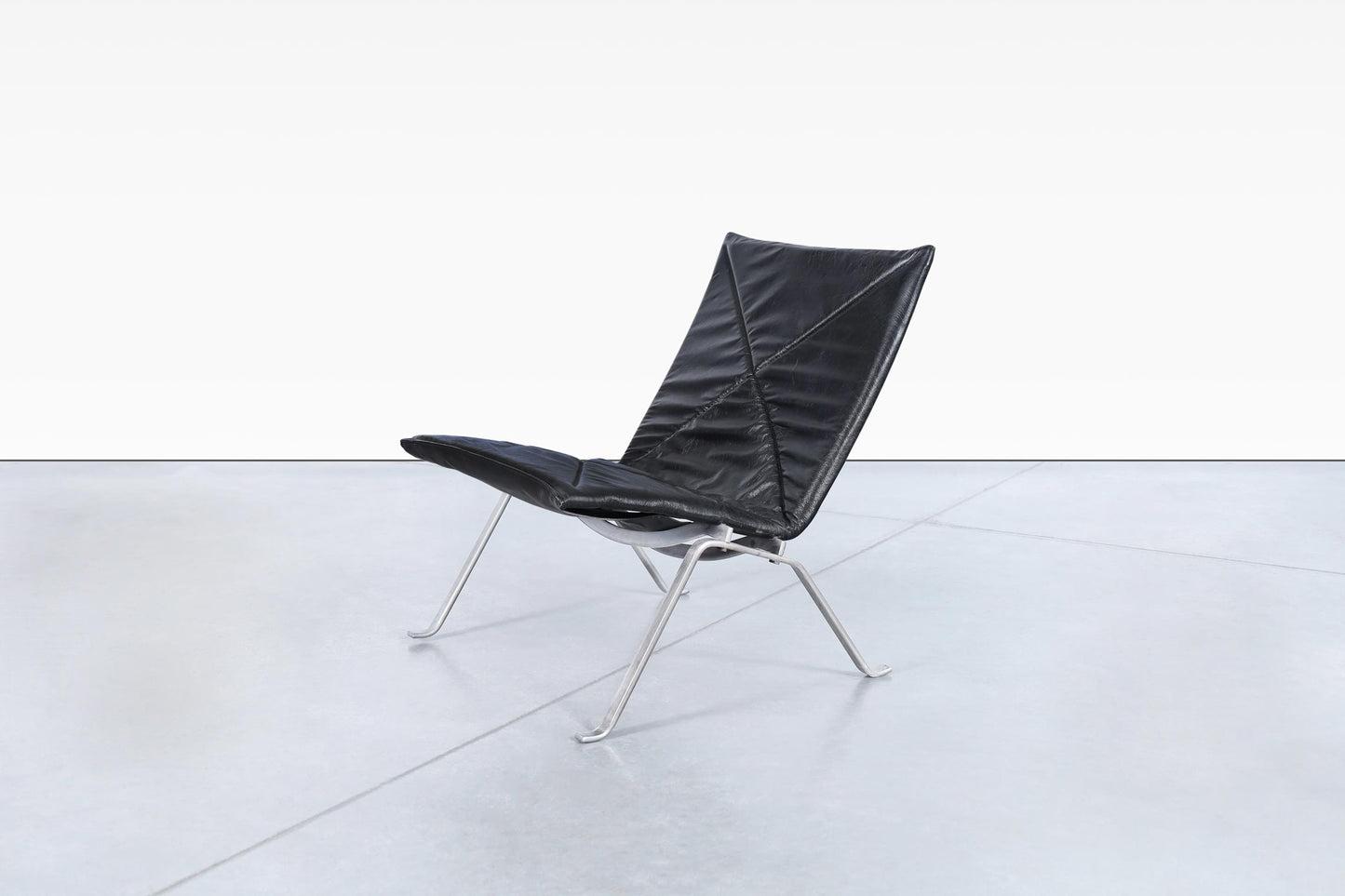 Early Leather PK22 Lounge Chairs by Poul Kjearholm for E. Kold Christensen