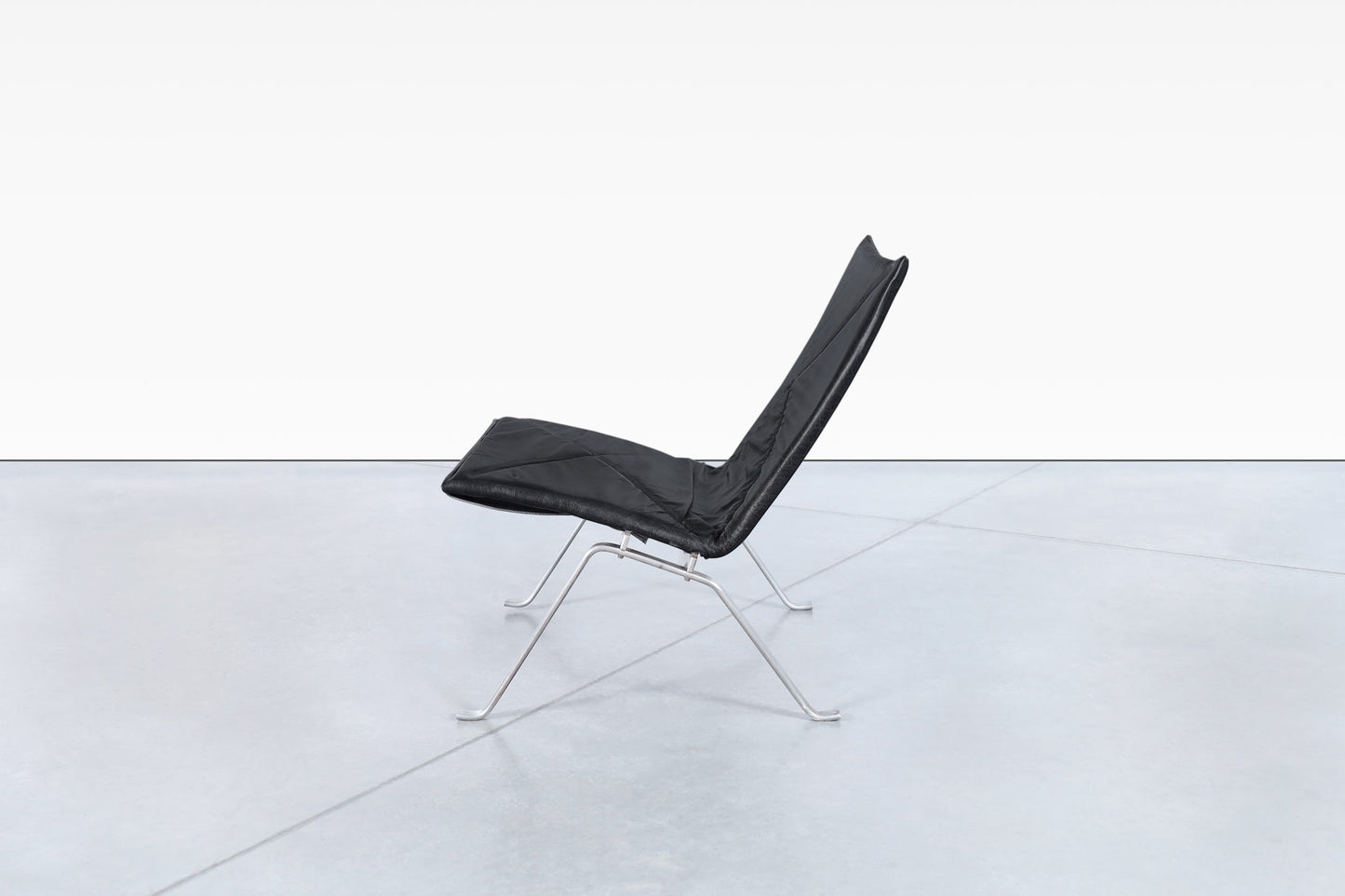 Early Leather PK22 Lounge Chairs by Poul Kjearholm for E. Kold Christensen