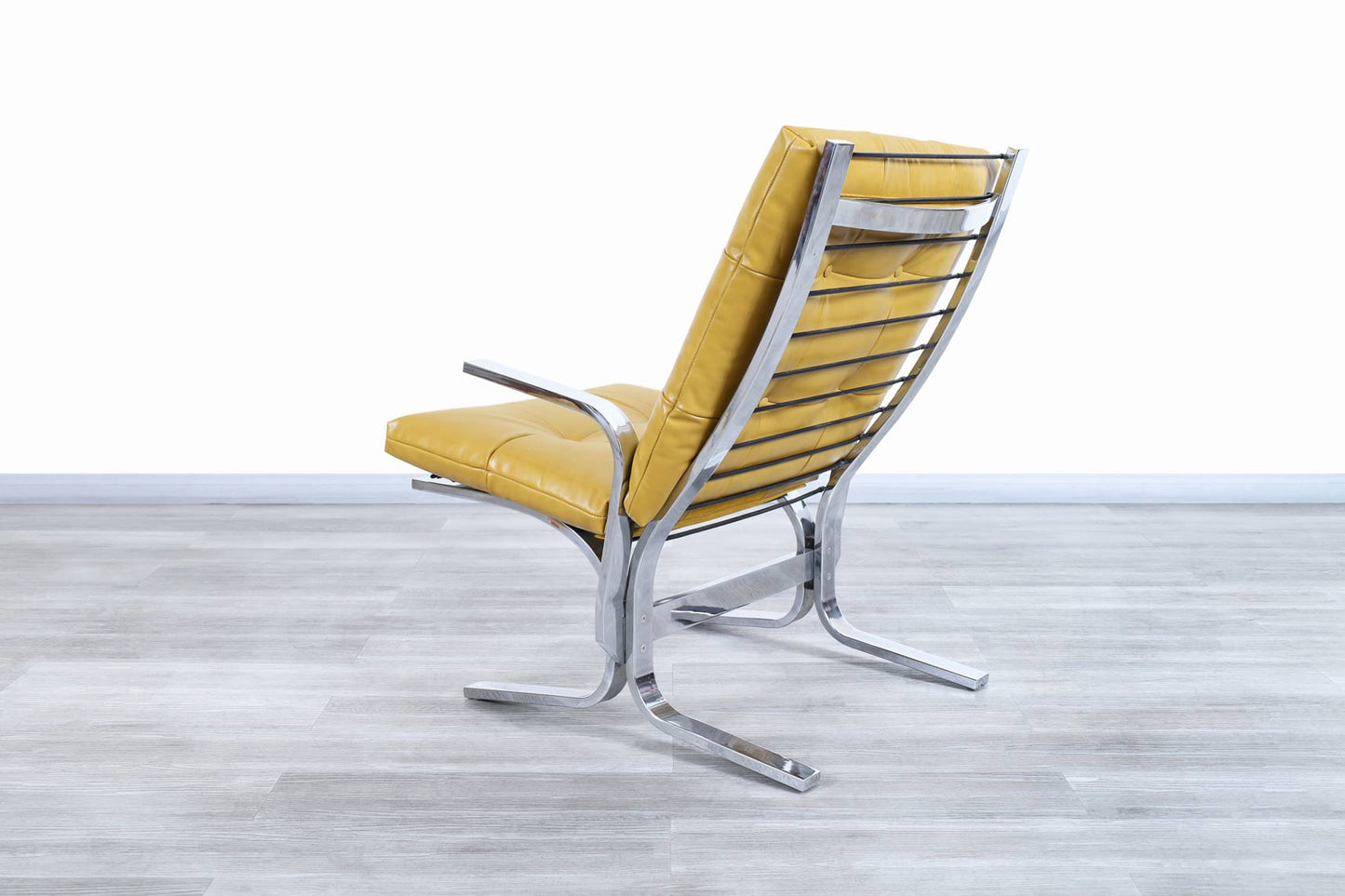 Vintage Chrome and Leather Lounge Chair and Ottoman