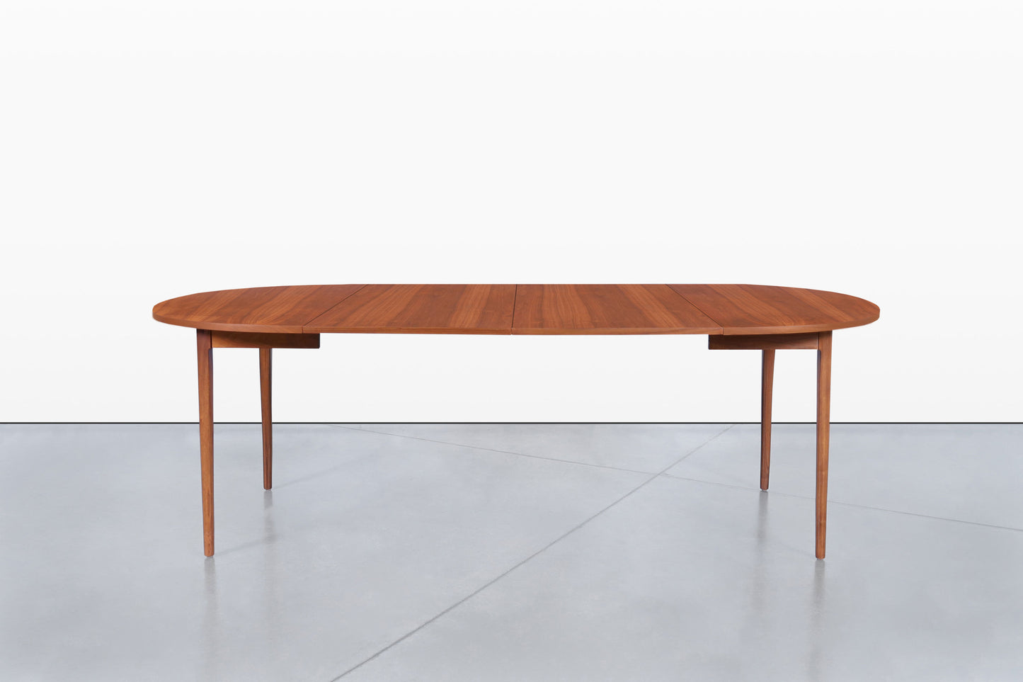 Mid-Century Extendable Round Walnut Dining Table by Kipp Stewart for Drexel