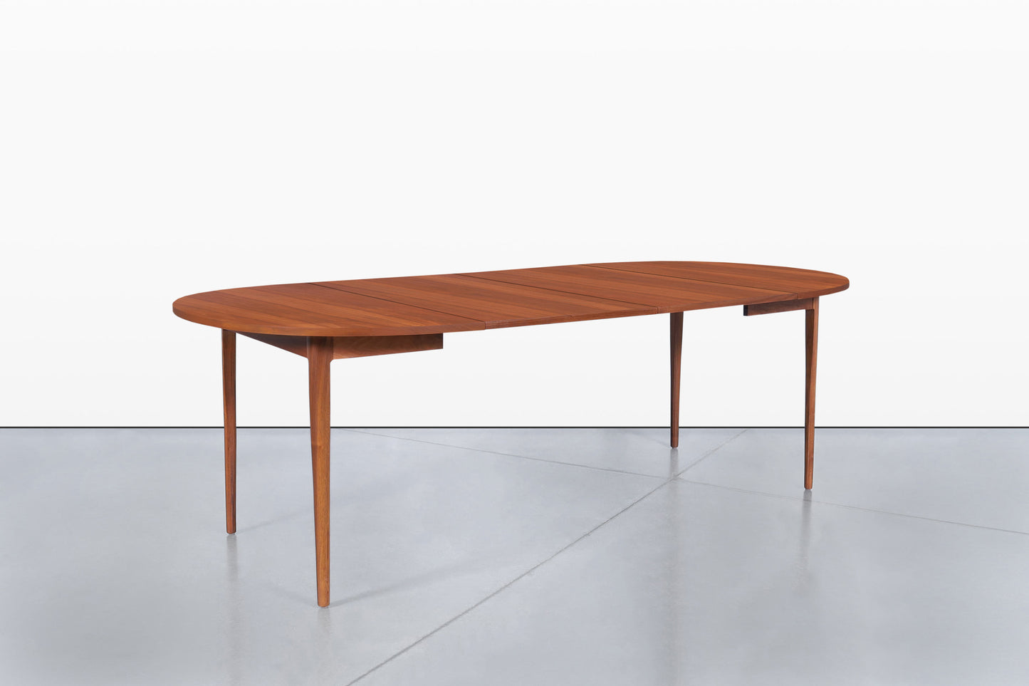 Mid-Century Extendable Round Walnut Dining Table by Kipp Stewart for Drexel