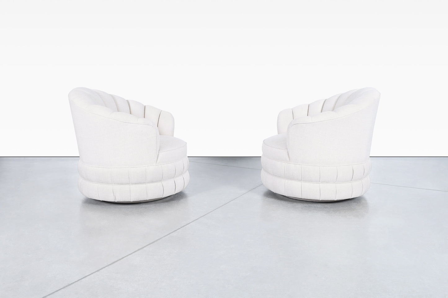 Mid-Century Modern Channel Back Swivel Lounge Chairs