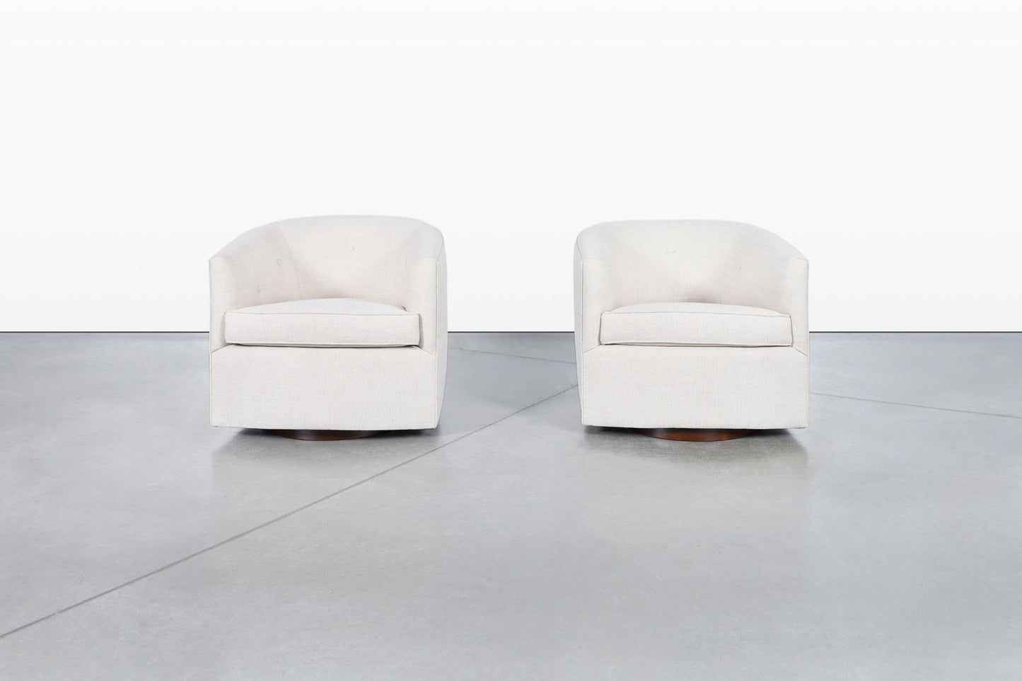 Mid-Century Modern Walnut Swivel Lounge Chairs