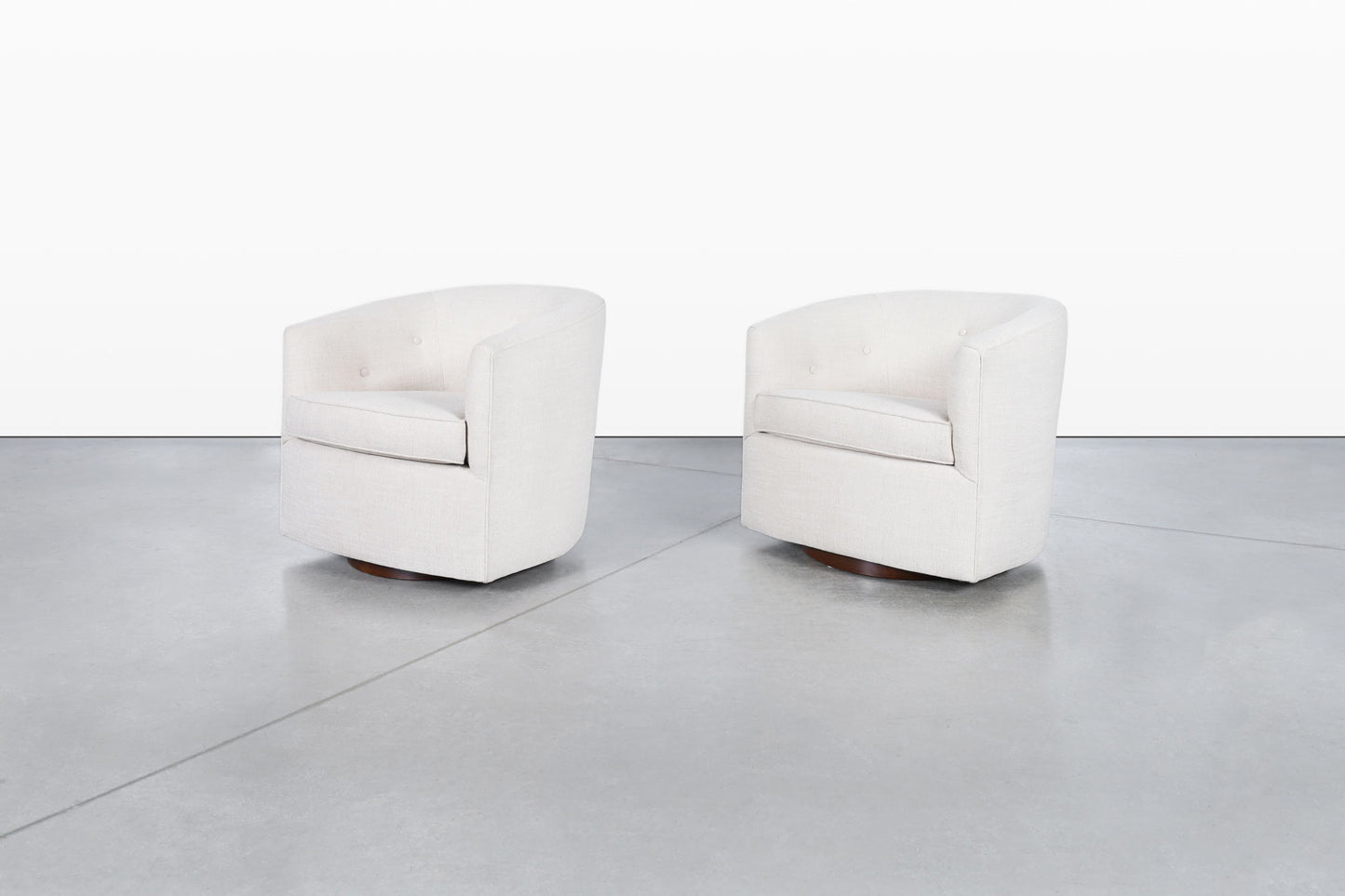 Mid-Century Modern Walnut Swivel Lounge Chairs