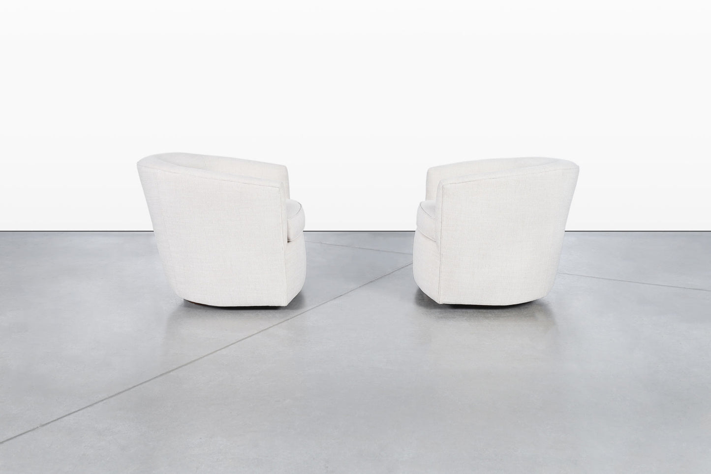 Mid-Century Modern Walnut Swivel Lounge Chairs