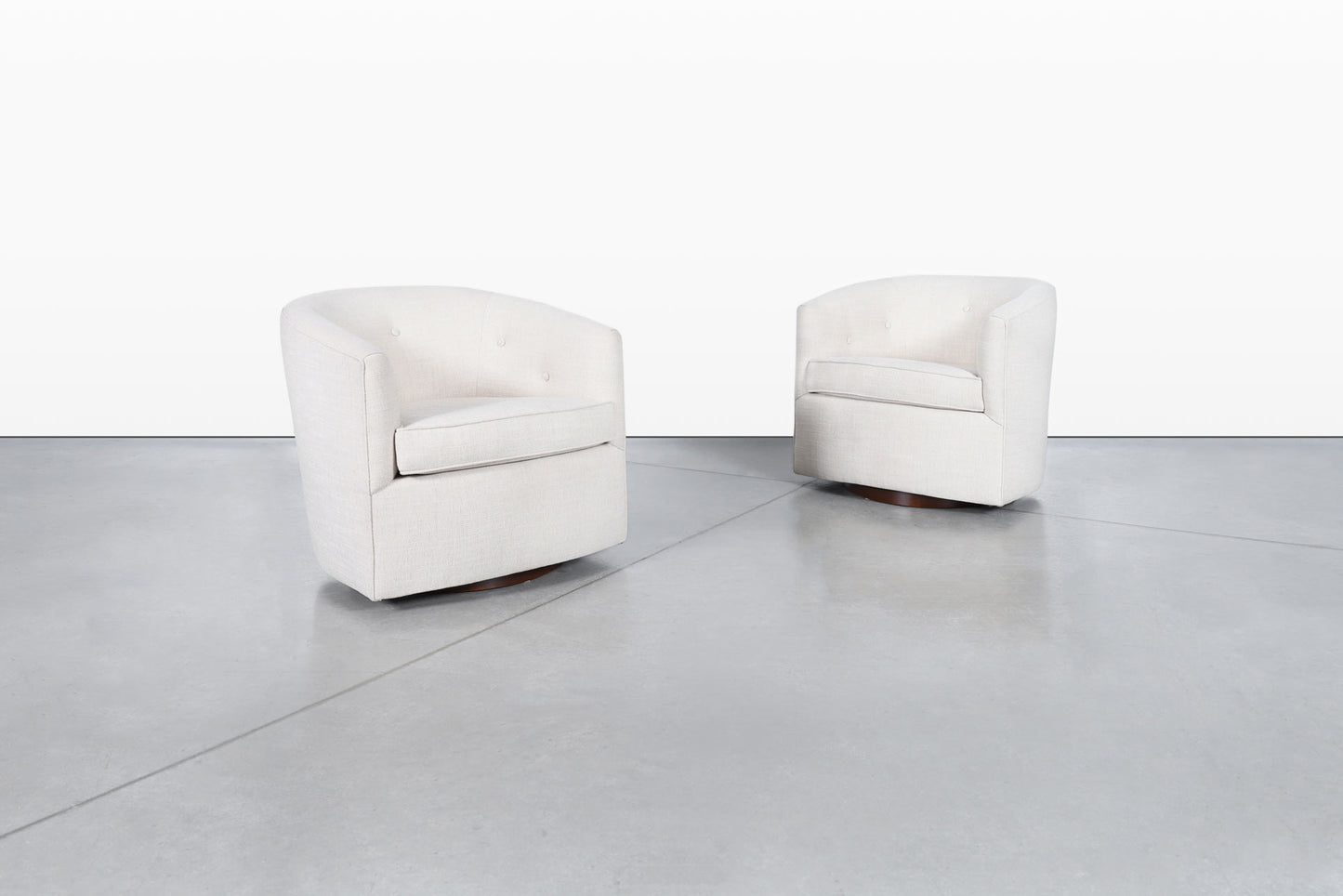 Mid-Century Modern Walnut Swivel Lounge Chairs