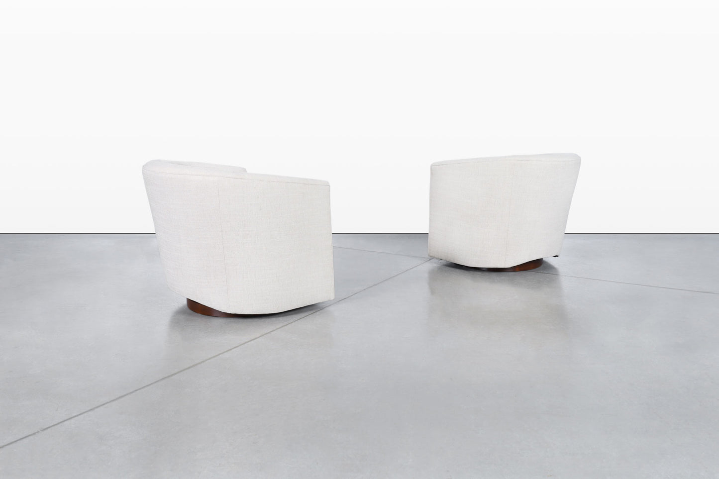 Mid-Century Modern Walnut Swivel Lounge Chairs