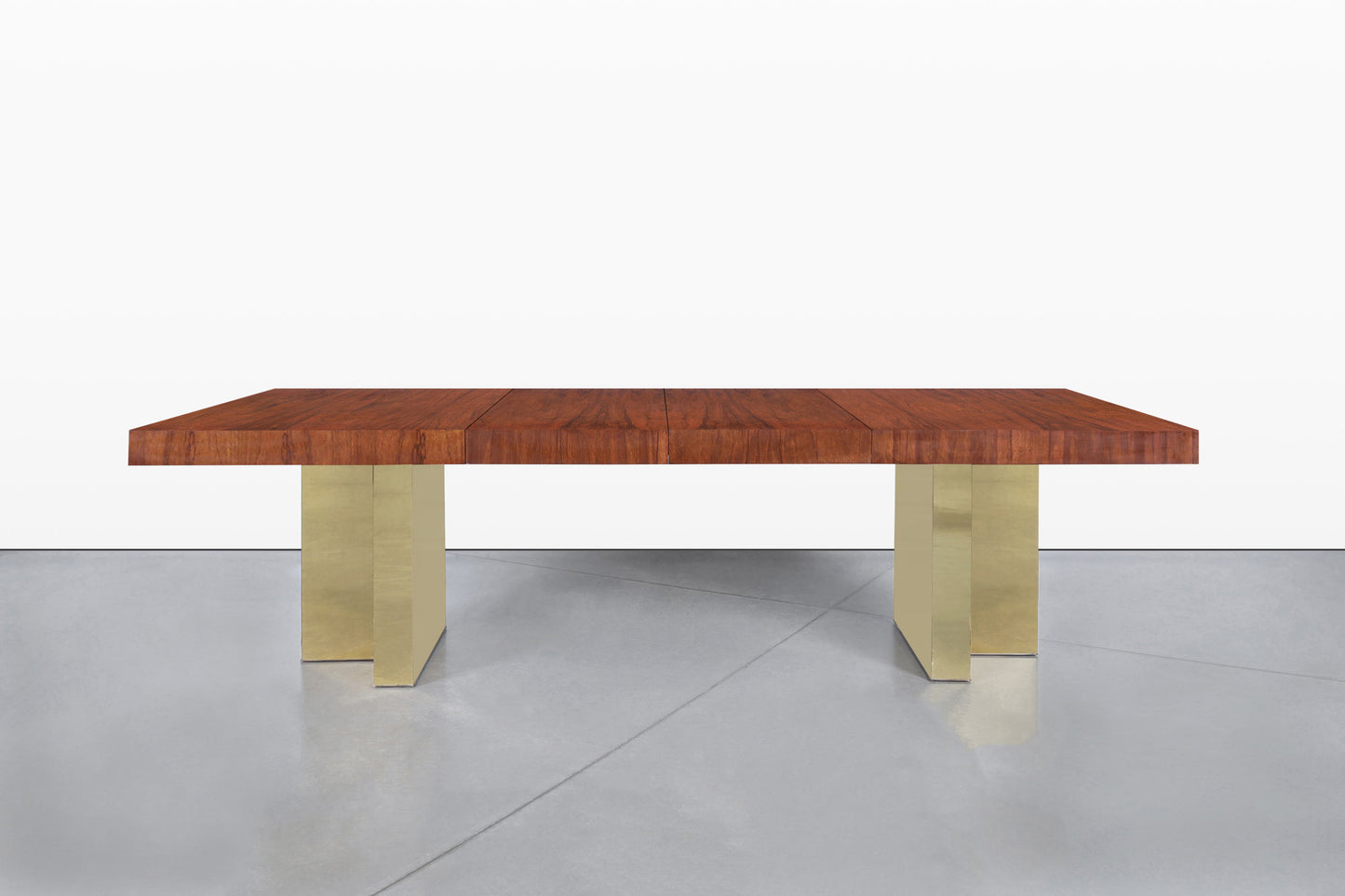 Mid-Century Walnut and Brass Expanding Dining Table by Milo Baughman