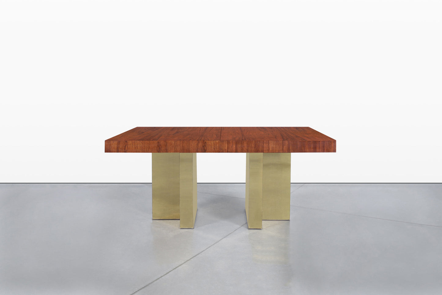 Mid-Century Walnut and Brass Expanding Dining Table by Milo Baughman