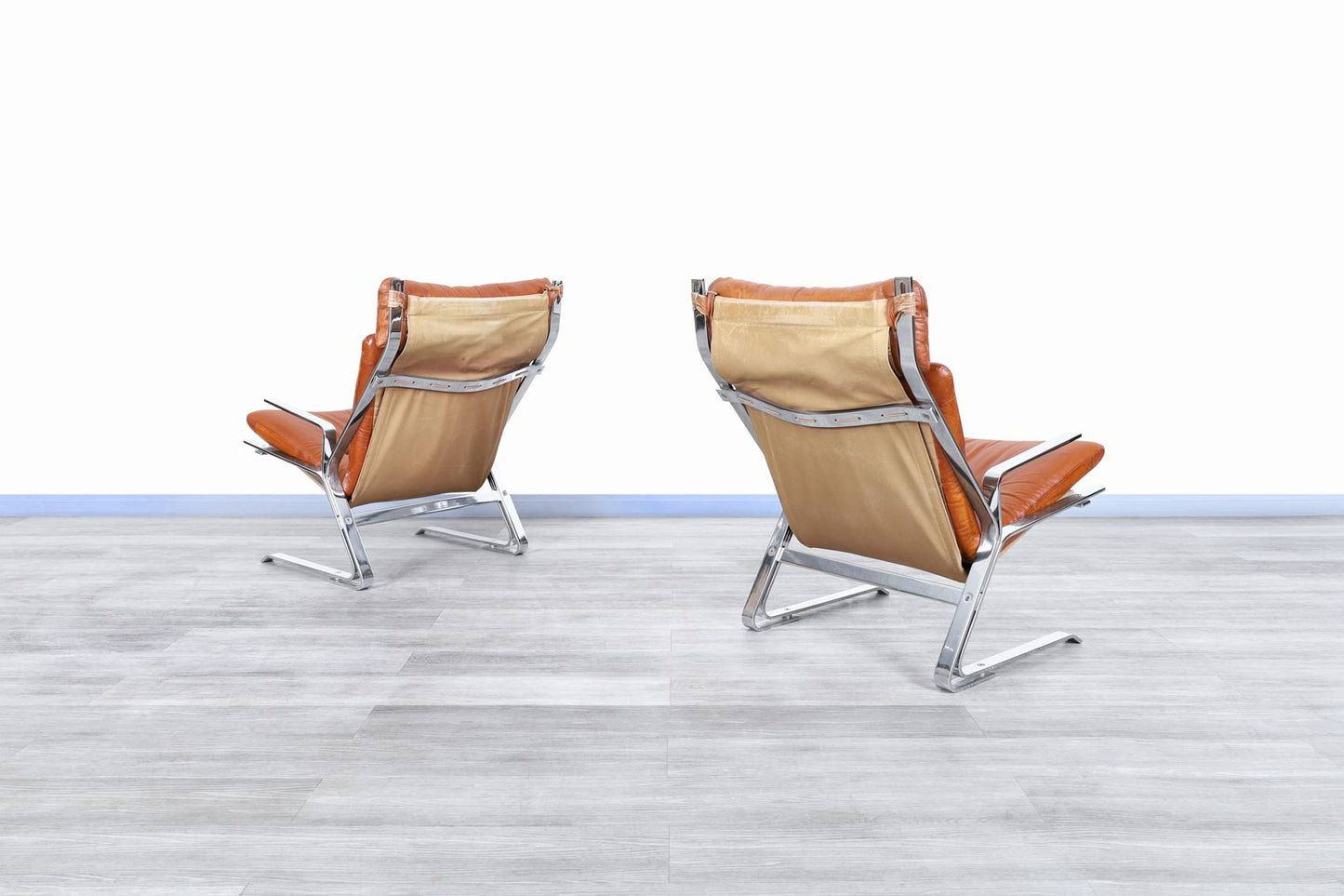Mid-Century Leather and Chrome Lounge Chairs by Elsa and Nordahl Solheim