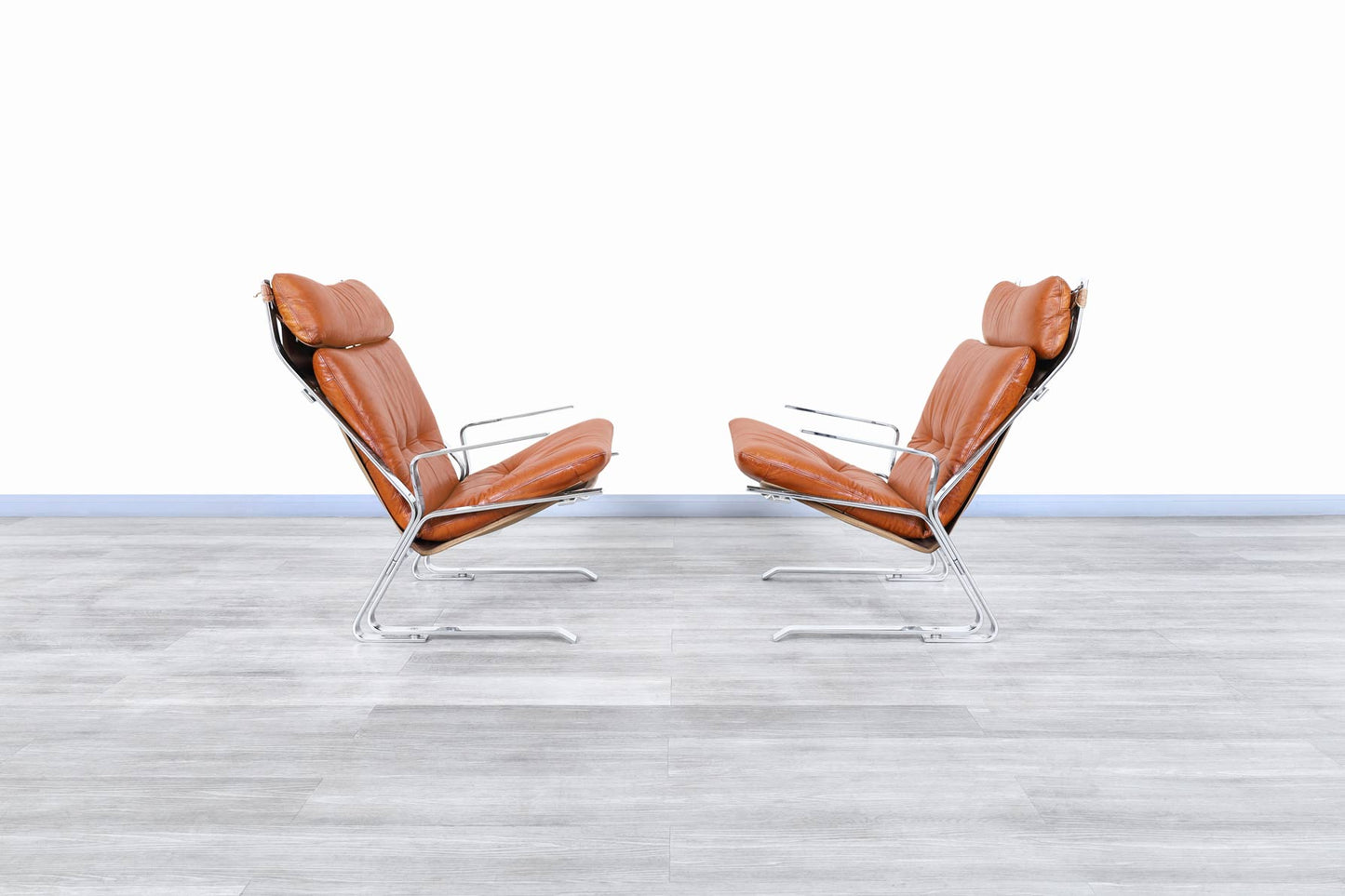 Mid-Century Leather and Chrome Lounge Chairs by Elsa and Nordahl Solheim