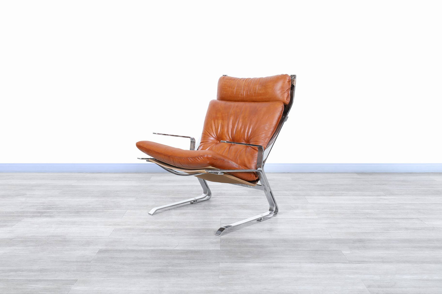 Mid-Century Leather and Chrome Lounge Chairs by Elsa and Nordahl Solheim