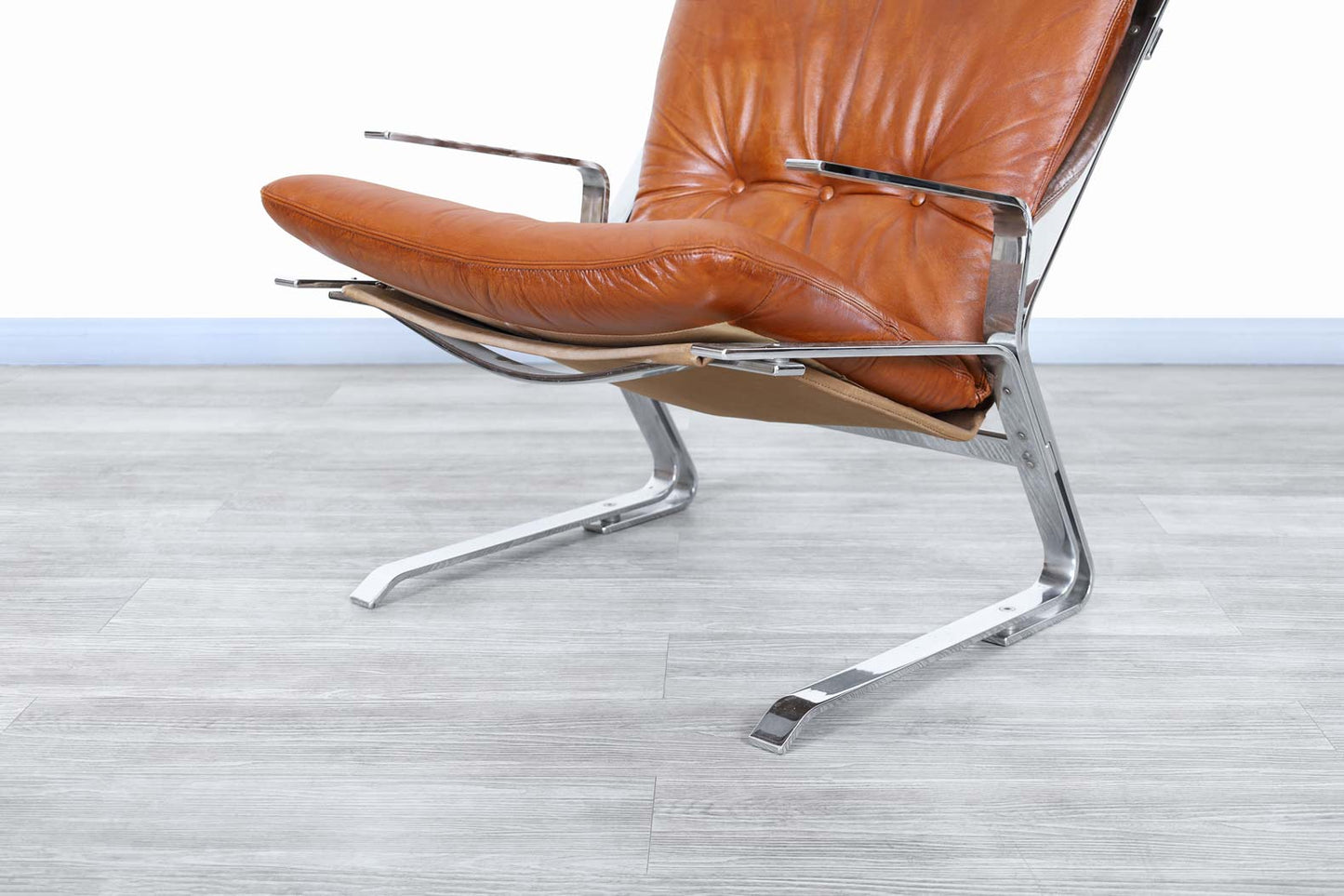 Mid-Century Leather and Chrome Lounge Chairs by Elsa and Nordahl Solheim