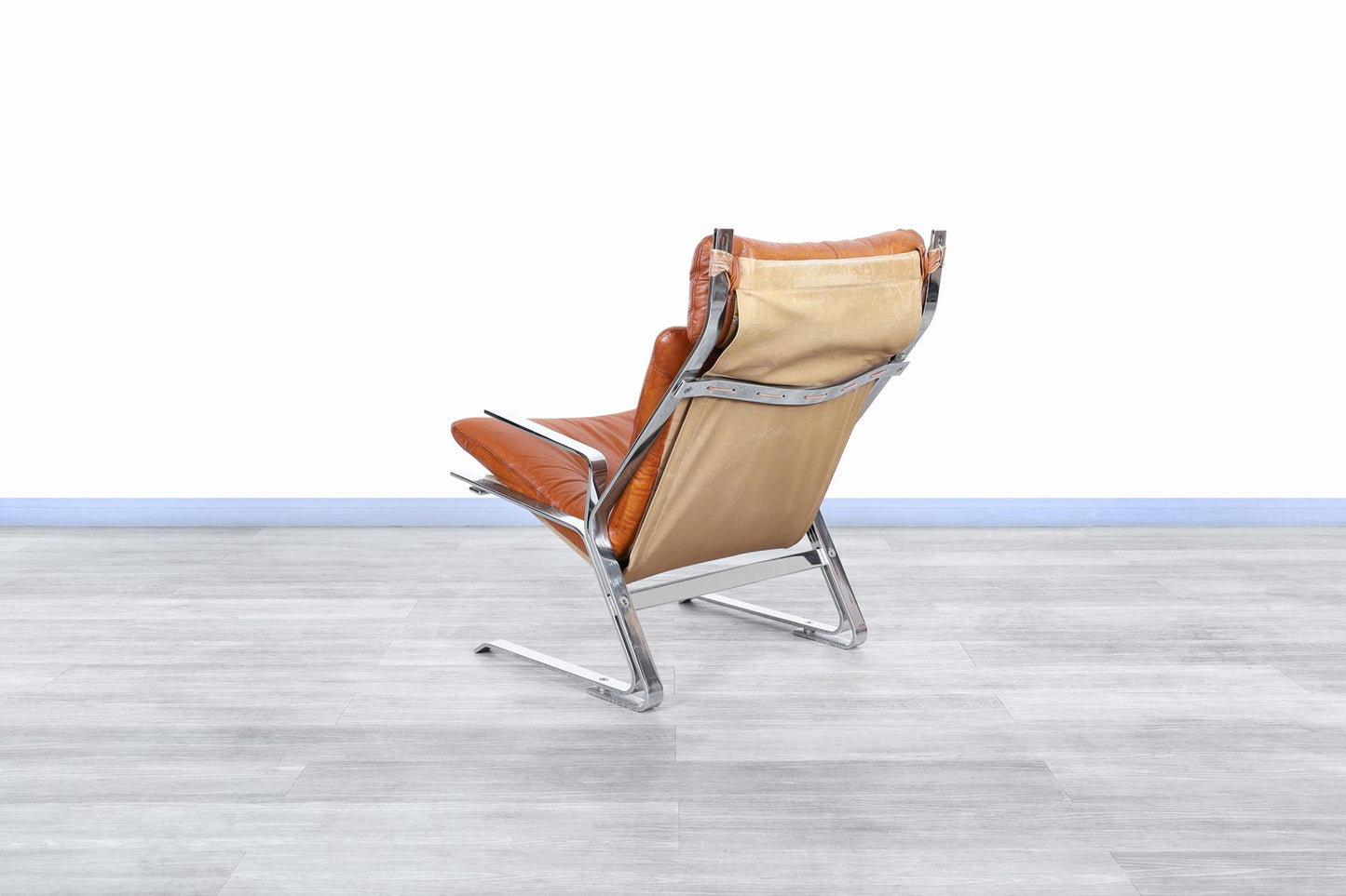 Mid-Century Leather and Chrome Lounge Chairs by Elsa and Nordahl Solheim
