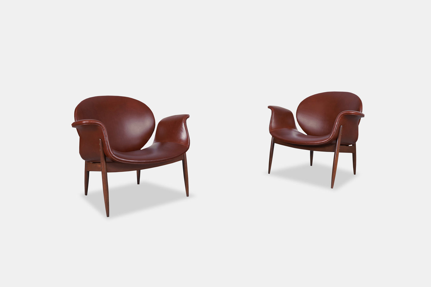 Vintage Leather and Walnut "Swan" Lounge Chairs by Arthur Umanoff