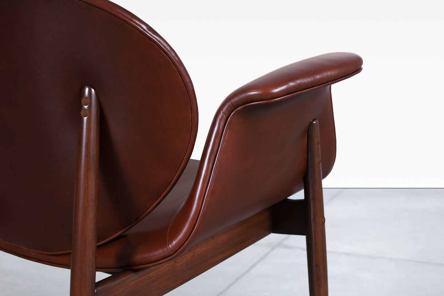 Vintage Leather and Walnut "Swan" Lounge Chairs by Arthur Umanoff