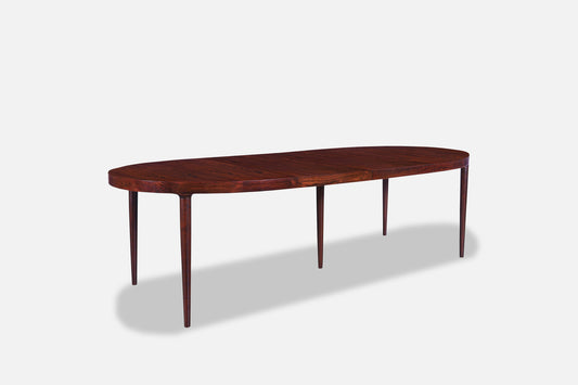 Danish Modern Expanding Rosewood Dining Table by Harry Ostergaard