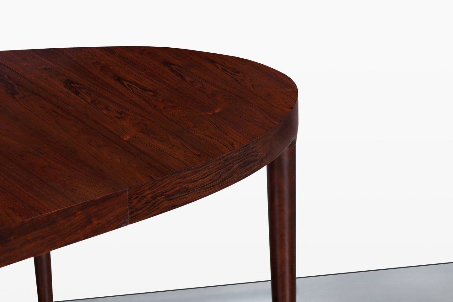 Danish Modern Expanding Rosewood Dining Table by Harry Ostergaard