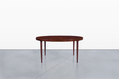 Danish Modern Expanding Rosewood Dining Table by Harry Ostergaard