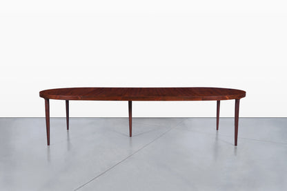 Danish Modern Expanding Rosewood Dining Table by Harry Ostergaard
