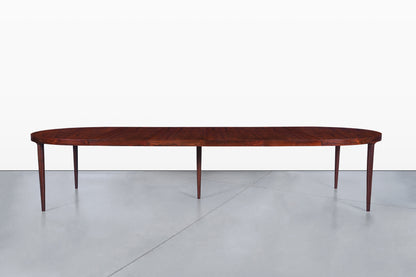 Danish Modern Expanding Rosewood Dining Table by Harry Ostergaard
