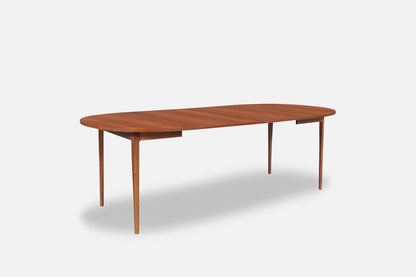 Mid-Century Extendable Round Walnut Dining Table by Kipp Stewart for Drexel
