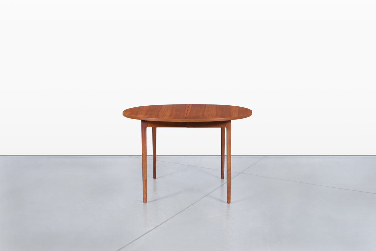 Mid-Century Extendable Round Walnut Dining Table by Kipp Stewart for Drexel