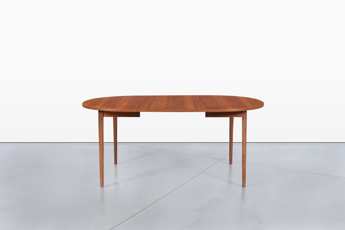 Mid-Century Extendable Round Walnut Dining Table by Kipp Stewart for Drexel
