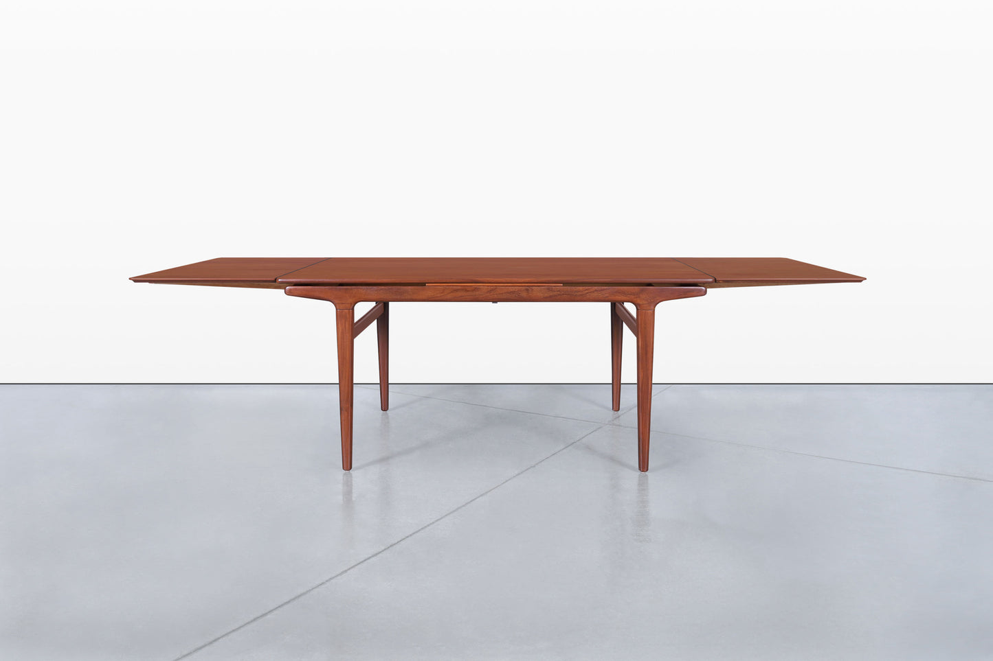 Mid-Century Modern Expanding Teak Dining Table by Johannes Andersen