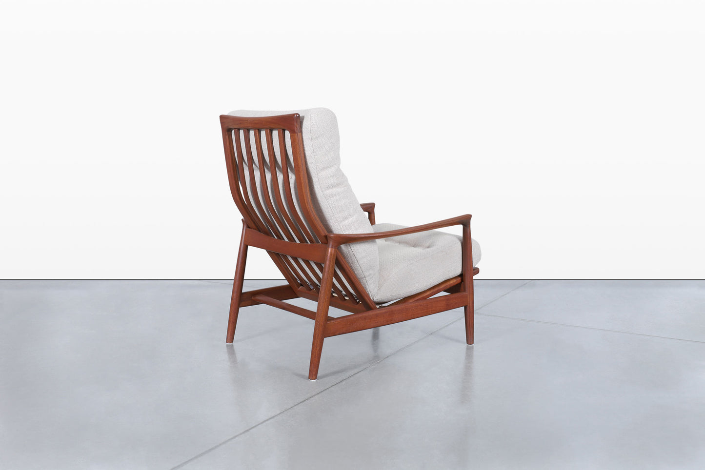 Mid-Century Modern “Stanford” Teak Lounge Chair by Folke Ohlsson for DUX