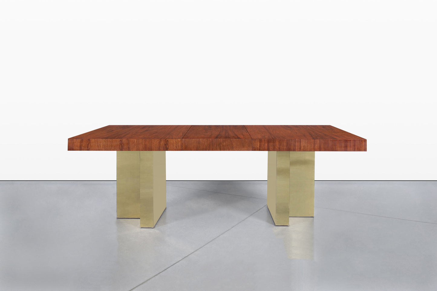 Mid-Century Walnut and Brass Expanding Dining Table by Milo Baughman