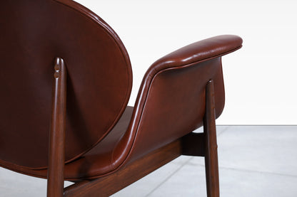 Vintage Leather and Walnut "Swan" Lounge Chairs by Arthur Umanoff
