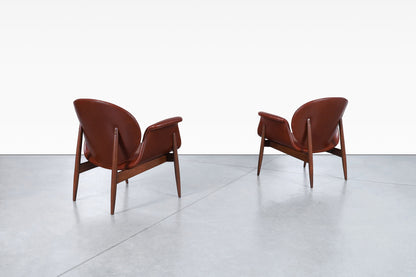 Vintage Leather and Walnut "Swan" Lounge Chairs by Arthur Umanoff