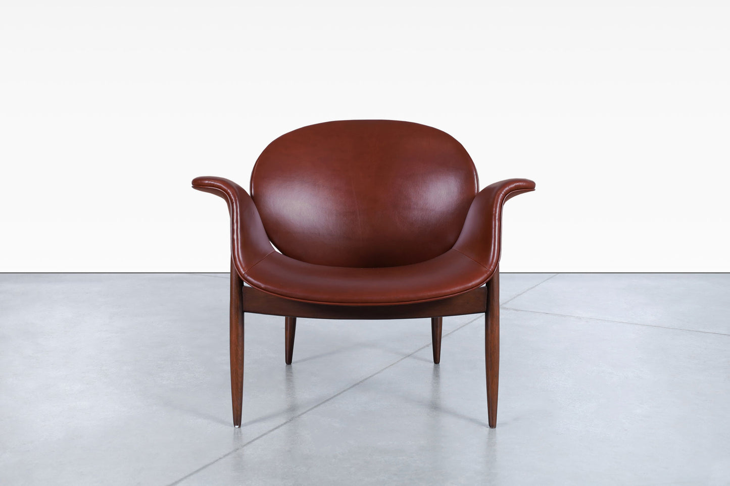 Vintage Leather and Walnut "Swan" Lounge Chairs by Arthur Umanoff