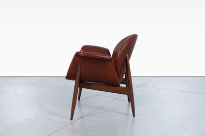 Vintage Leather and Walnut "Swan" Lounge Chairs by Arthur Umanoff