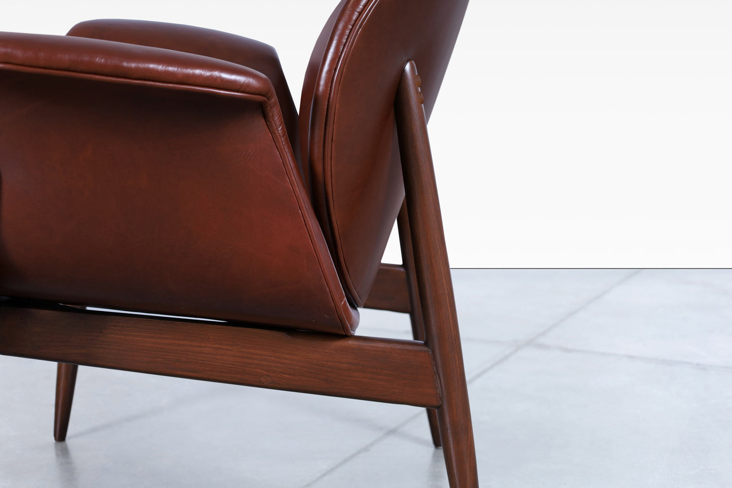 Vintage Leather and Walnut "Swan" Lounge Chairs by Arthur Umanoff